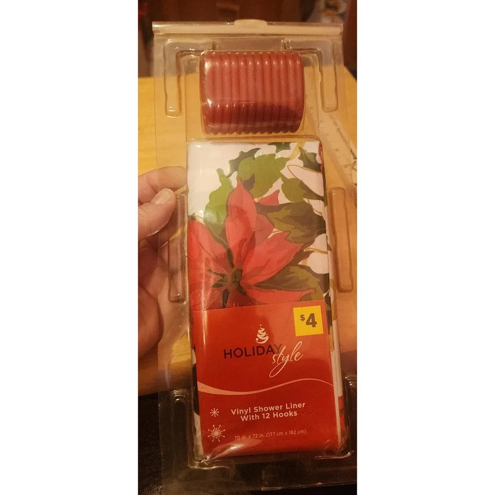 Poinsettia shower curtain with hooks, possibly vintage